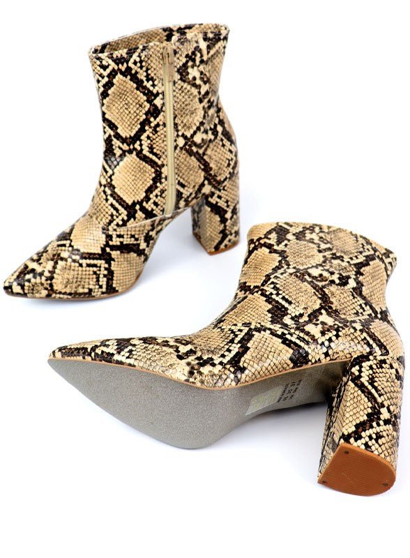 Pointed Toe Bootie with a Block Heel - -