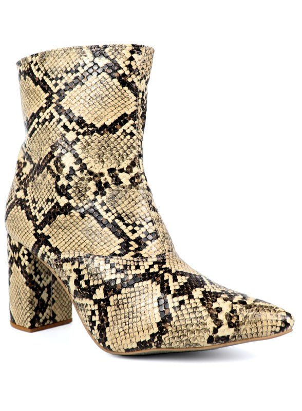 Pointed Toe Bootie with a Block Heel - -