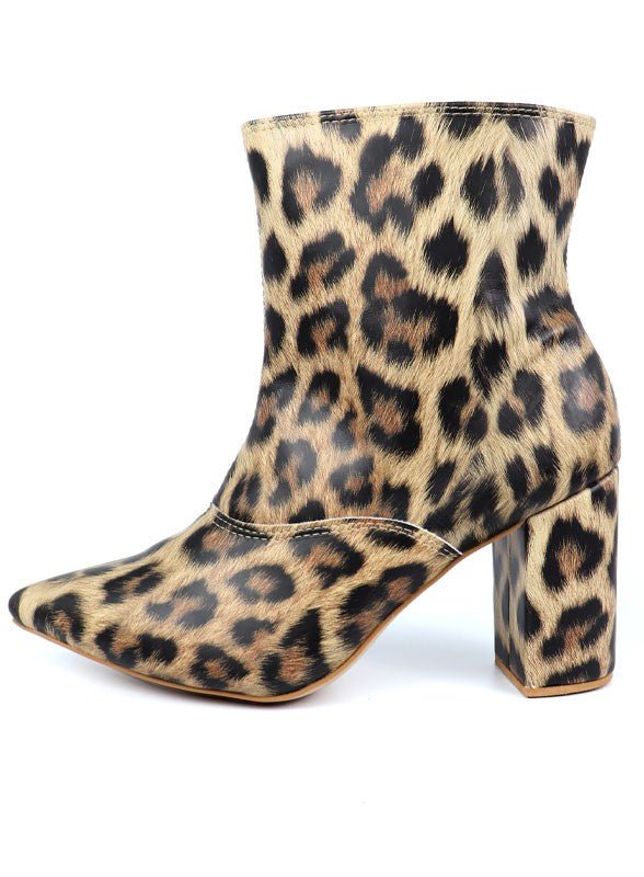 Pointed Toe Bootie with a Block Heel - -
