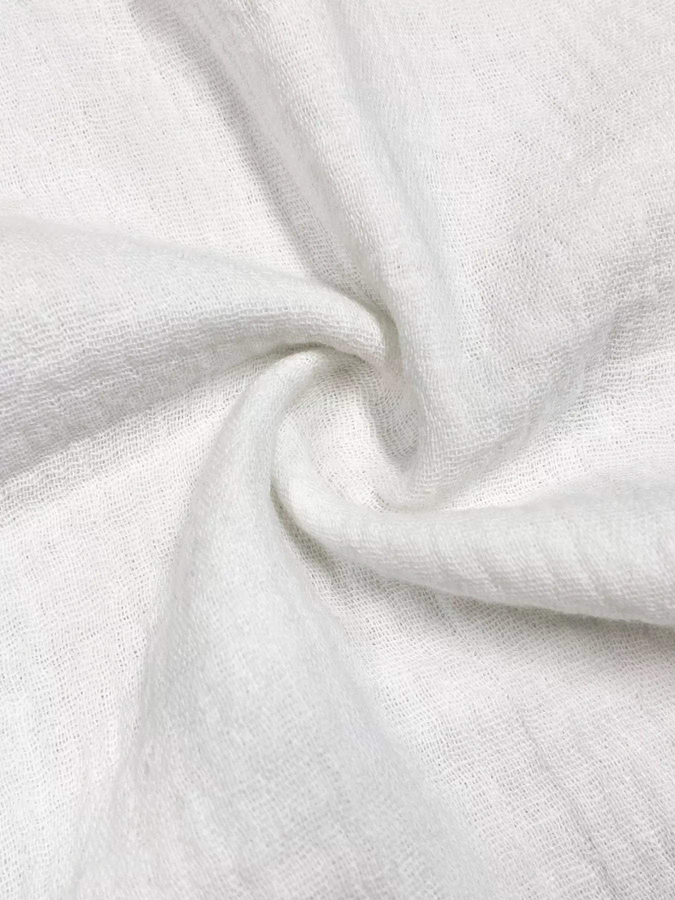 White Linen Fabric – soft-textured, lightweight fabric made of breathable 100% linen.