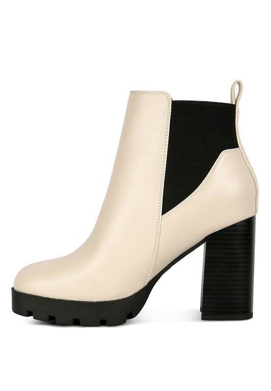 Cream ankle boot, leather, high heel with black elastic side panel and chunky treaded sole