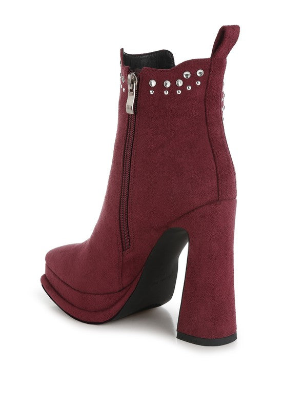 Burgundy suede ankle boot with block heel and silver stud detailing around the ankle.