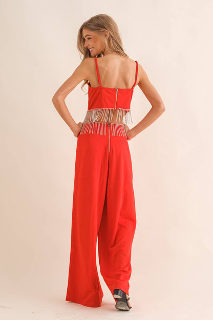 Red sequin fringe top and wide-leg pant set with back zippers and embellished crystal trim.