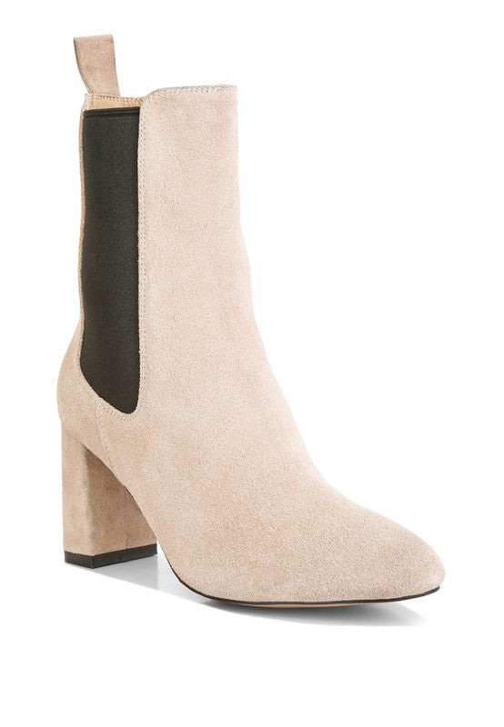 Beige suede ankle boot with block heel and black elastic side panel for easy slip-on wear