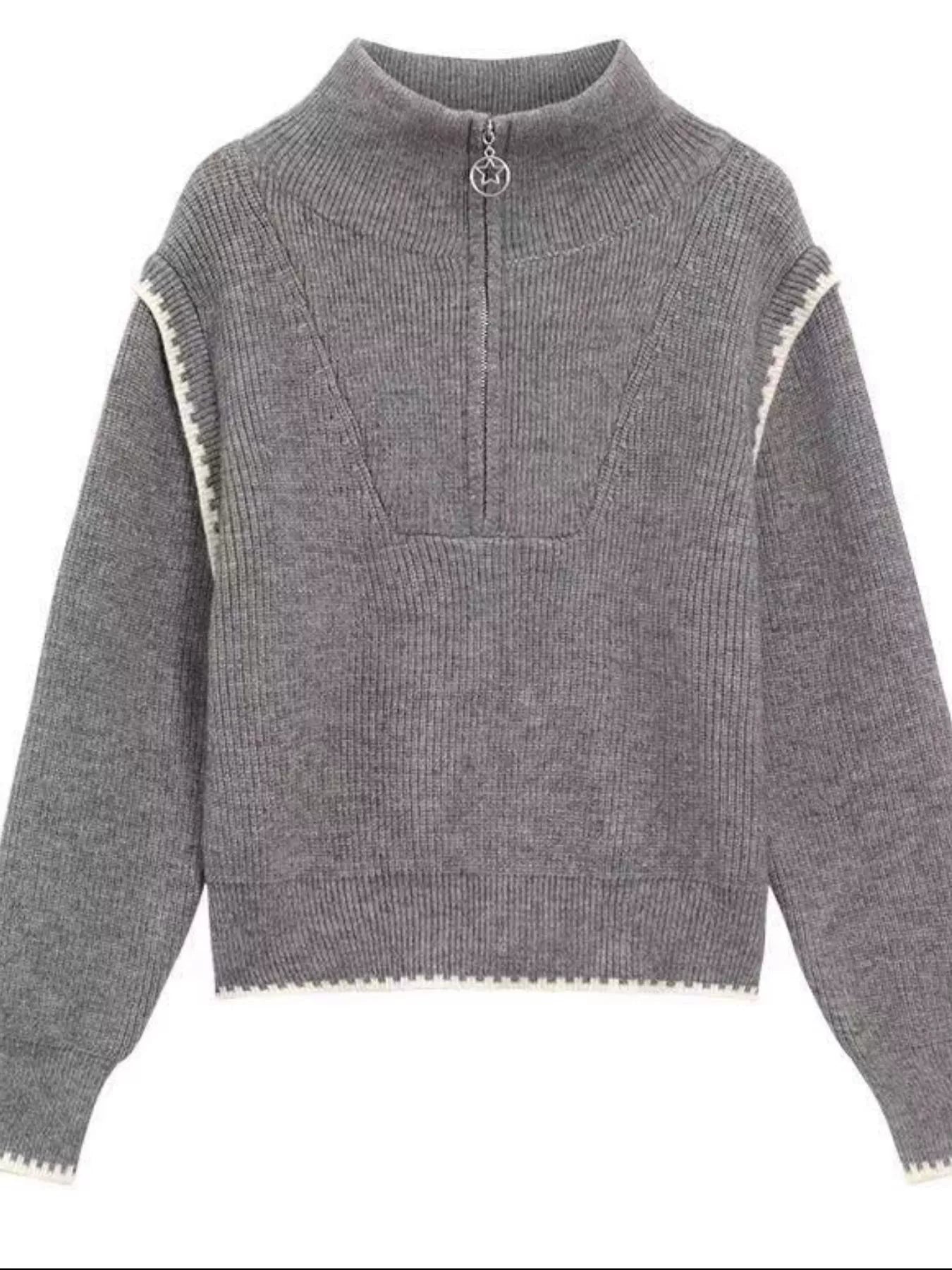 Gray knit sweater with zipper detail, high collar, and ribbed wool-blend fabric