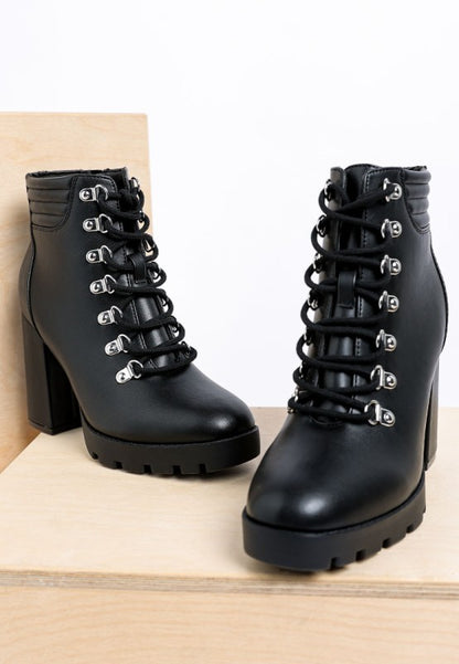 Black leather lace-up ankle boots with chunky block heels and metal eyelets.