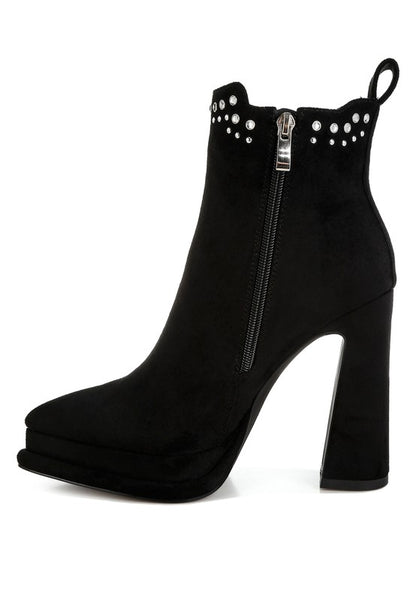 Black suede ankle boot with block heel and silver stud detailing around the collar