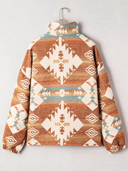 Brown and cream patterned fleece jacket with mock neck and geometric tribal print.