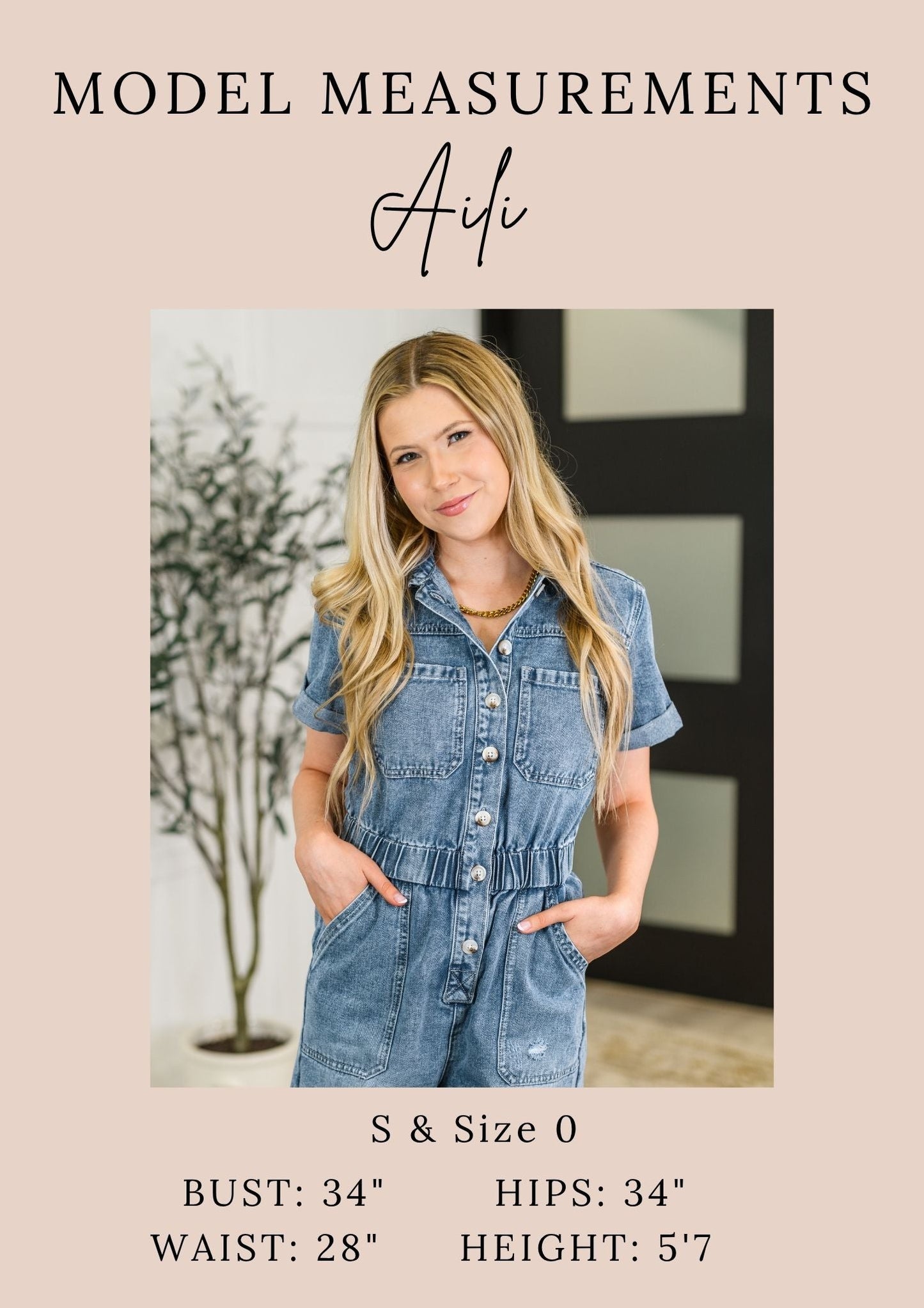 Aili blue denim romper with short sleeves and front buttons made from washed cotton fabric