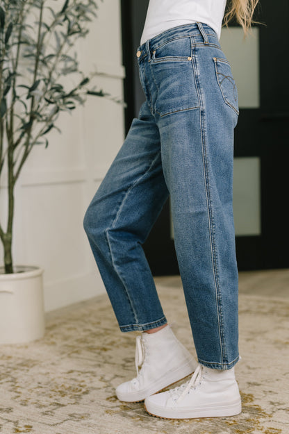 Classic Blue Denim Jeans, medium wash straight-leg style, made from 100% cotton for a comfortable fit.