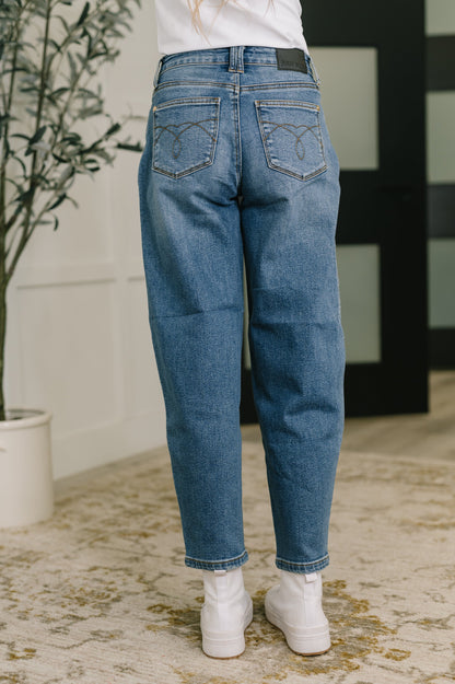 Judy Blue blue denim jeans with a relaxed fit and embroidered back pockets