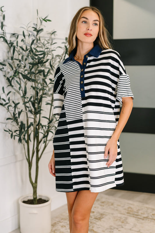 Striped Polo Dress in black and white, short sleeve style with a contrasting navy collar and soft cotton fabric.