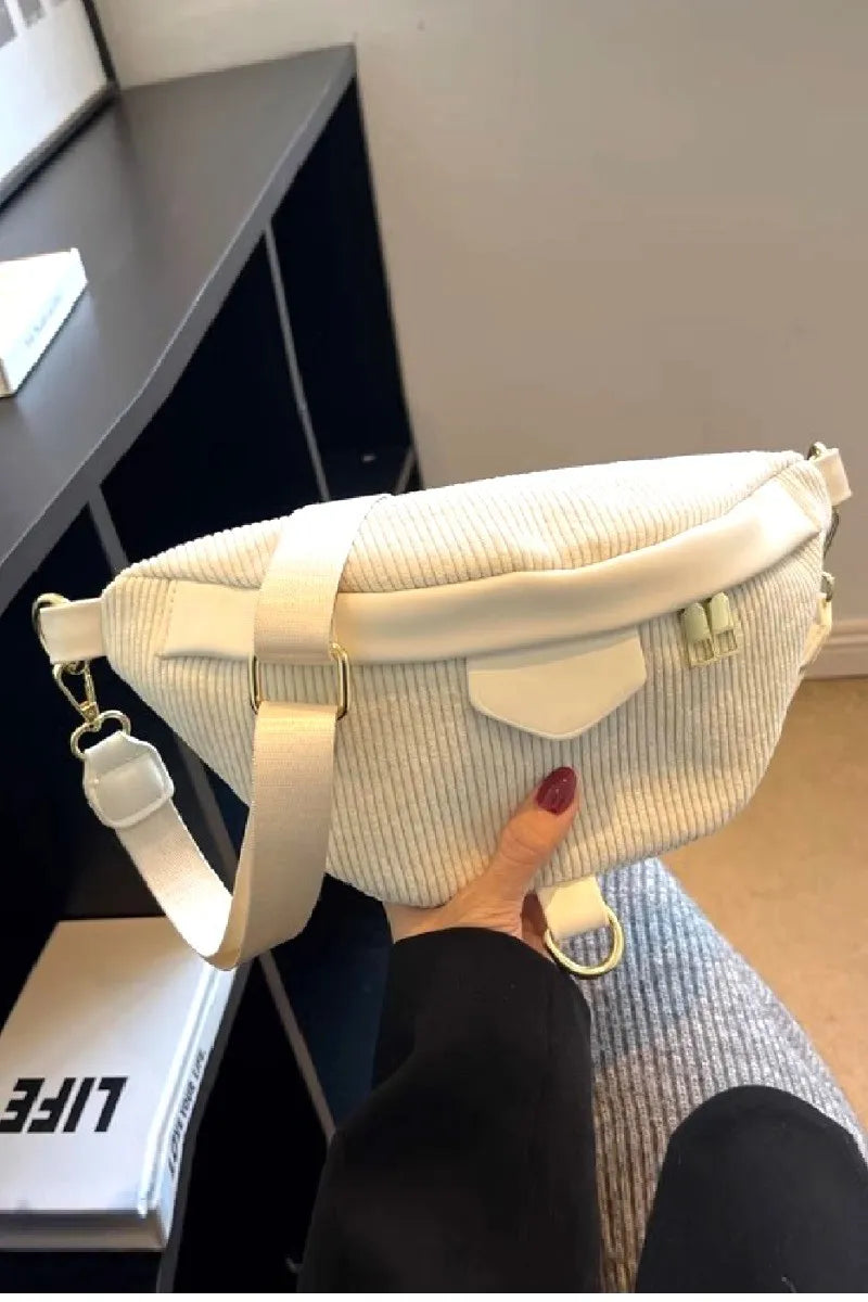 Corduroy Waist Bag in white, crossbody style with adjustable strap and front zipper pocket.