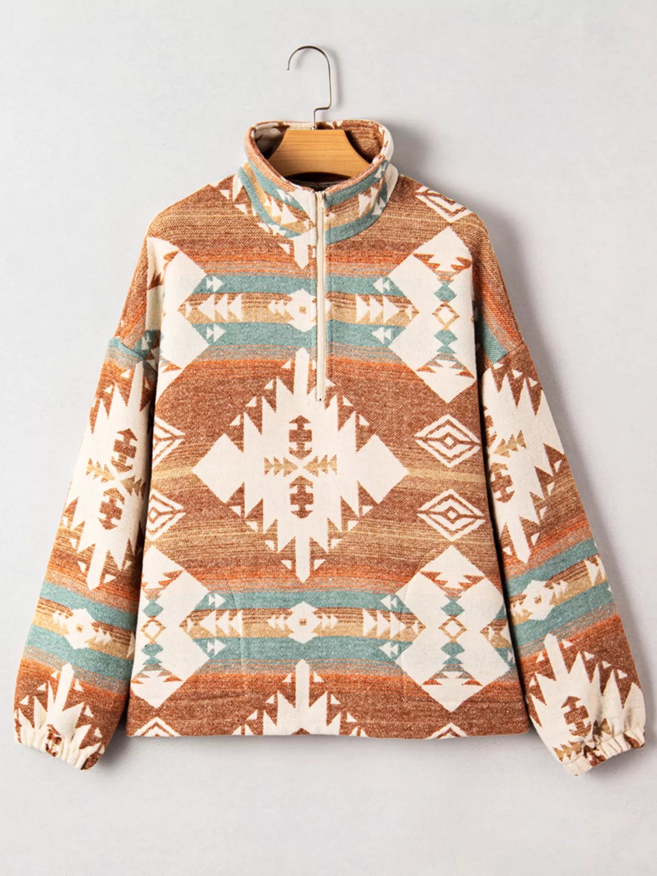 Southwest Print Pullover, brown and cream, fleece jacket with quarter-zip front and tribal pattern design.