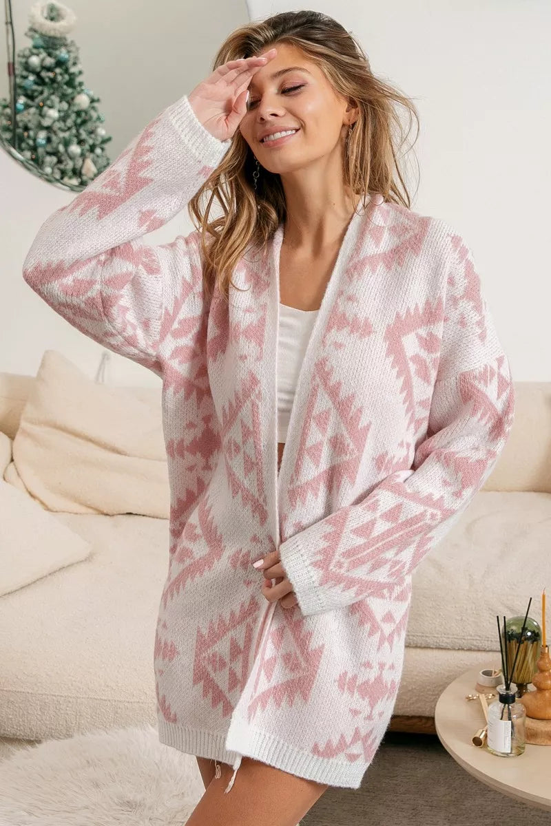 Pink and white Aztec cardigan, open-front sweater in soft knit fabric.