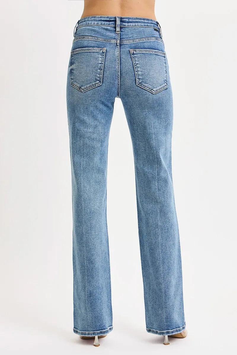 Light blue high-rise straight jeans with back pockets and stretch denim fabric.