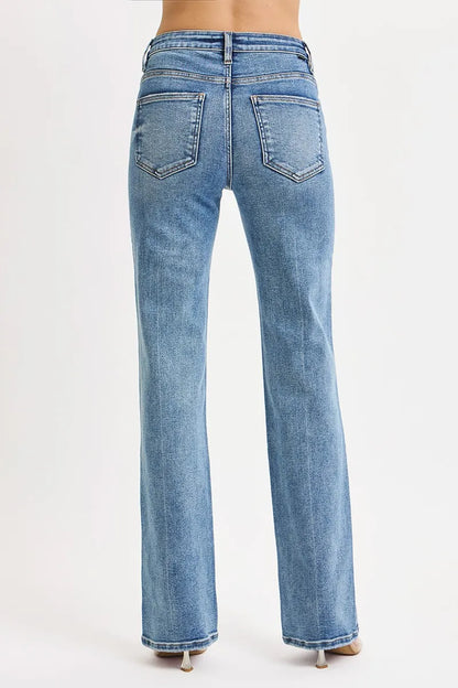 Light blue high-rise straight jeans with back pockets and stretch denim fabric.