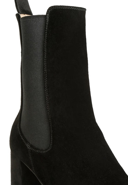 Black suede ankle boot with block heel and elastic side panel for easy slip-on.