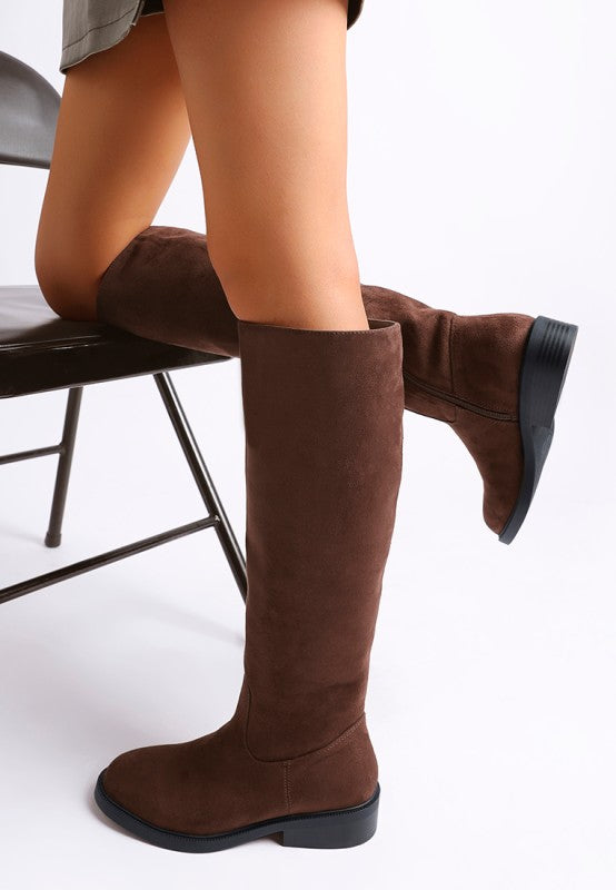 Brown suede knee-high boots with a low block heel