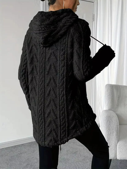Black hooded sweater with drawstring, knit-textured fleece for warmth and comfort