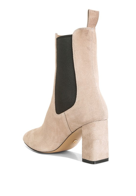 Beige suede ankle boot with block heel and black elastic side panel for easy slip-on fit
